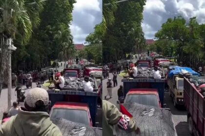 Ratusan truk pengangkut sampah memadati kawasan Kantor Gubernur Bali, Selasa (23/12/2025), dalam aksi unjuk rasa Forum Swakelola Sampah Bali menolak rencana penutupan TPA Suwung yang dinilai belum disertai solusi pengelolaan sampah pengganti. Foto: Tangkap layar IG @fakta.indo