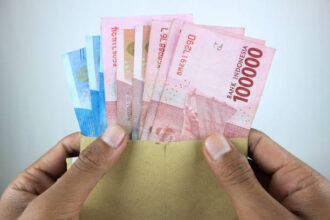 Ilustrasi, kenaikan UMP DKI Jakarta 2026 menjadi Rp5.729.876 yang mulai berlaku 1 Januari 2026. Foto: Istock @Aufa Fahmi