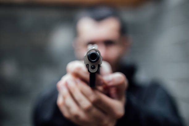 Ilustrasi, Seorang ASN RS Bhayangkara Tebing Tinggi diamankan polisi usai diduga melakukan penembakan terhadap warga di Simalungun, Sumatera Utara. Foto: Istock @FlyMint Agency