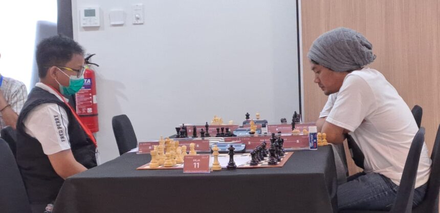 Kanan MN Ricky Rismanto vs Anak Agung Ngurah Ramachandra di babak pertama