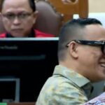 Eks Wamenaker Immanuel Ebenezer Gerungan atau Noel saat persidangan pembacaan surat dakwaan di Pengadilan Tipikor, Senin (19/1/2026). Foto: ipol.id