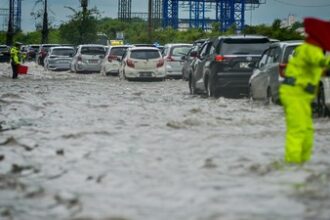 Tol arah Bandara tergenang air. Foto : Ist