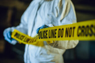 Ilustrasi garis polisi. Foto: Istcok @D-Keine