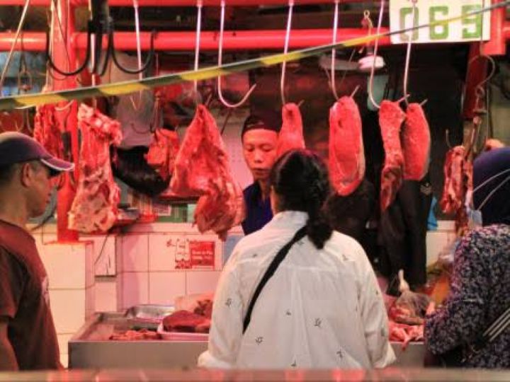 lustrasi penjual daging di pasar tradisional. (Foto istimewa)