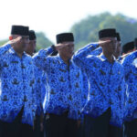 Ilustrasi, Pemerintah lewat Airlangga Hartarto menetapkan ASN kerja dari rumah 1 hari dalam sepekan, plus pembatasan kendaraan dinas hingga 50%. Foto: Istcok @Yamtono_Sardi