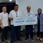 PROTEKSI: Penyerahan manfaat program BPJS Ketenagakerjaan kepada me ahli waris di Jakarta.  Foto: BPJS Ketenagakerjaan