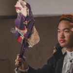 Penampilan Christopher Jason Santoso saat menjadi dalang pada pagelaran See You Soon 2023 di Tower 2 ITS