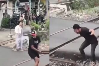 Warga memblokir rel kereta api di Kelurahan Garuntang, Bandar Lampung. Foto: Tangkap layar IG @andreli_48