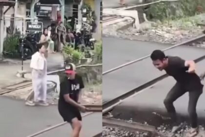 Warga memblokir rel kereta api di Kelurahan Garuntang, Bandar Lampung. Foto: Tangkap layar IG @andreli_48