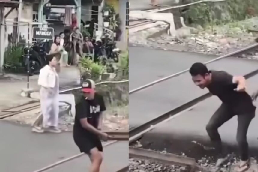 Warga memblokir rel kereta api di Kelurahan Garuntang, Bandar Lampung. Foto: Tangkap layar IG @andreli_48