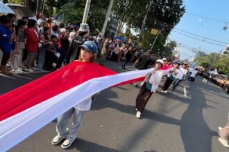 Bendera Merah Putih terbentang di Karnaval Paskah Kota Semarang. Foto: Ist