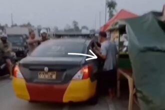 Oknum polisi diduga mengamuk sambil membawa pedang dan pistol di Jalan Letjen Ibrahim Adjie, Tarogong Kaler. Foto: Tangkapan layar Instagram @feedgramindo