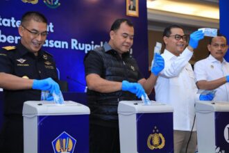 uang palsu dimusnahkan
