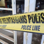 Ilustrasi kamar kos mahasiswi Fakultas Kedokteran Hewan di Jalan Gubeng Kertajaya, Surabaya, dipasang garis polisi. Foto: Istock @Anggi Dharma Prasetya
